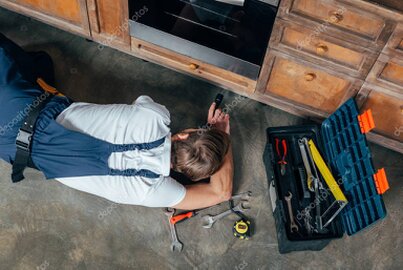 Local handyman standing with tools ready for home repairs