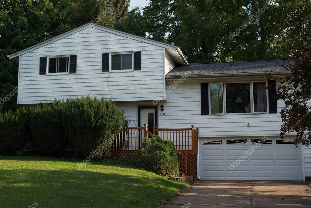 Exterior trim with peeling paint before handyman repainting