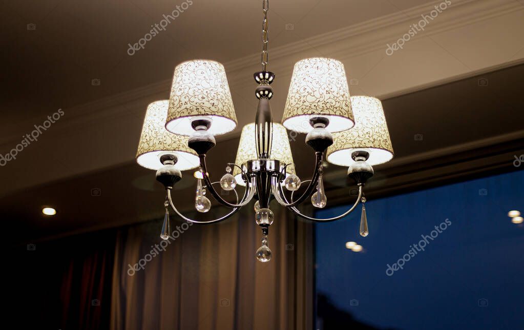 Outdated ceiling light fixture before replacement