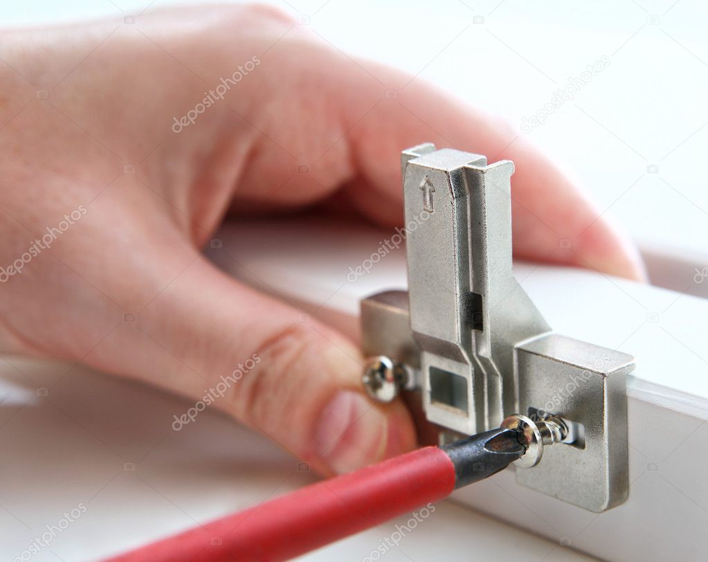 Interior door with loose hinges and misaligned latch